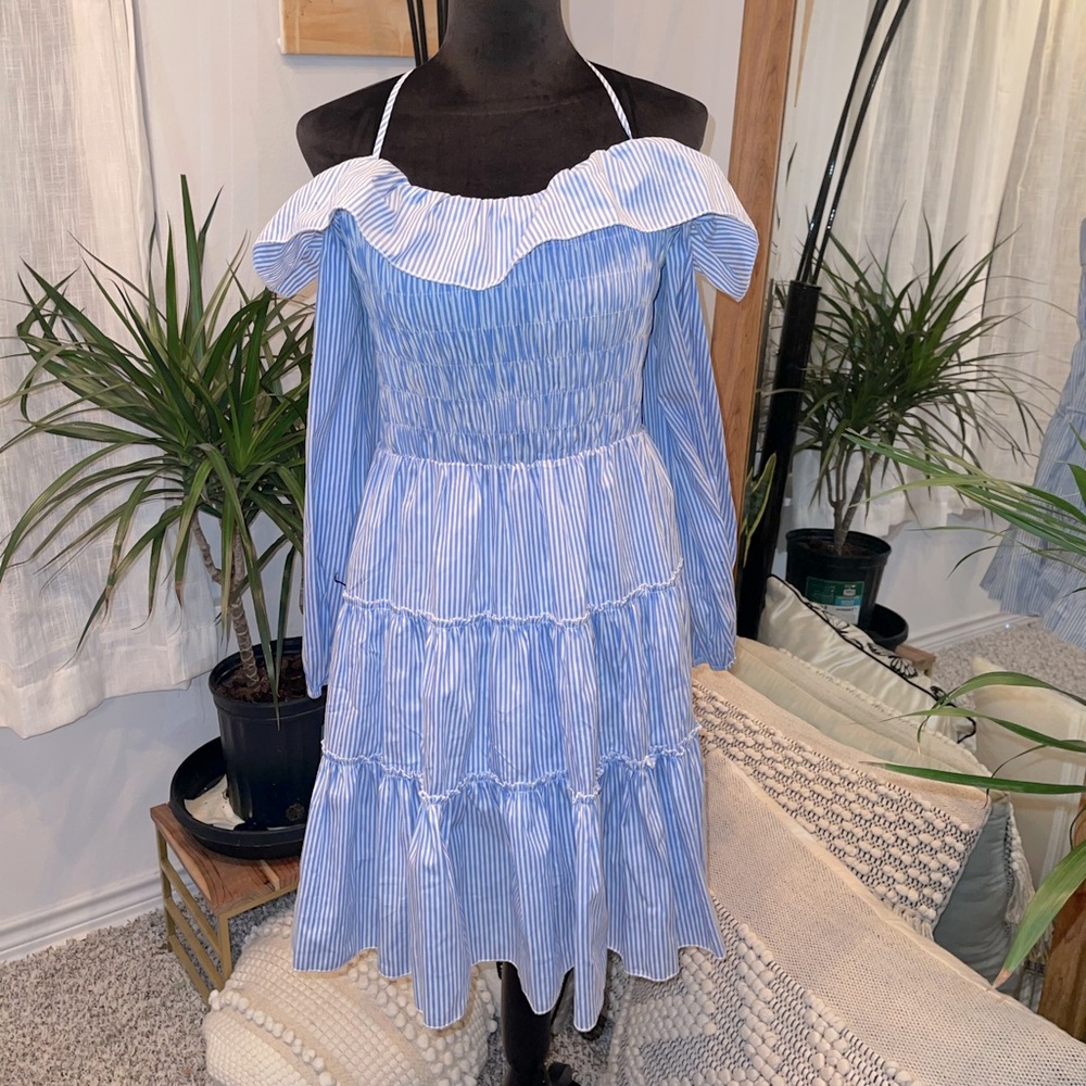 Off the shoulder blue and white striped sundress.